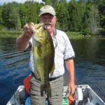 While fishing with my friend Bob in the Muskokas in 2013, Pete Hopkins landed this wonderful largemouth. It was one of his best.