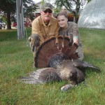 Proud father Dave with his daughter Amanda and her first turkey. A 21 pound gobbler, harvested at 32 yards with a 20 gauge shotgun.