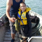 Darren Peterson and his son Evan, 7, on Lake St. Clair