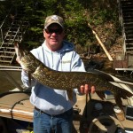 David Donaldson with a Northern Pike caught on Desert Lake with an orange and gold spoon