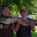 Dean Sealey, 13, caught this 14 1/2 pound, 43 1/2 inch pike with his friend Colton on Smith Lake.