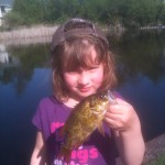 Fearless Leah Cavanagh,5, lipping her first fish