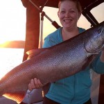 Josh Baker finally got his girlfriend, Sandy Holmes, out in the boat fishing with him and this is what she reeled in. Josh said she fought this 21-pound salmon to the boat by herself.