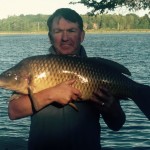 Paul Mussell of Osgoode, Ontario fishing early in the morning on the Rideau River caught a 20+ pound carp