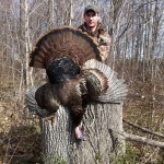 David Roberts Jr. proudly shows off his first turkey. Harvested opening week in Elgin County. Weight 20 lbs. 9.5" beard and one inch spurs.