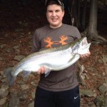 Ethan Bourgeois, 14, with a 21lb Rainbow trout he caught off Manitoulin Island