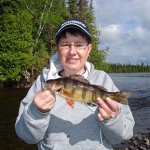 Mike Roy submitted this photo of Nicole Roy holding a perch that she caught while fishing the Floodwood River last spring with Mike.