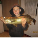 Brennen Moore, 8, snagged this 25" walleye out trolling one night