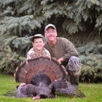 A great father/son moment from 2013. Liam Shea, 10, and his dad, Peter. Liam likes going out with his dad in the woods, even though he can’t hunt yet.