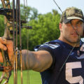 joe eppele holding a bow