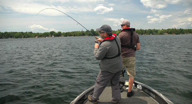 walleye hotspots - two guys fishing in a boat