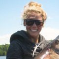 girl holding muskie