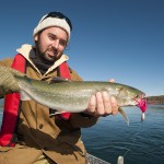 Storm Carroll with an average sized Arctic char from the Armshow River.