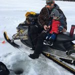 Calvin Pitt with his favorite fishing partner, his son, waiting for a bite near Sault Ste. Marie.