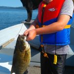 Jack Nelson was fishing with his Dad and his dog Blue when he reeled in his personal best smallie.