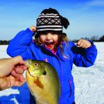 Olivia Lewis twitched her line to find this bluegill sunfish on the end of her favorite pink worm bait.