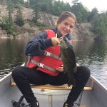 Alex North was fishing her favorite spot on the French River when she landed this small mouth bass. Her biggest to date!