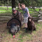 Jordan Foote of South Dundas poses with son Cooper and his second turkey harvest of the year.