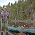 Catching fish from a canoe