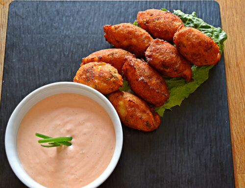 Pike croquettes served with homemade spicy dip