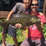 Nate Devitt, 10, of Bobcaygeon – seen with his dad, Joe – caught what he said was a 8.75 lb. smallmouth while tossing a topwater lure on Sturgeon Lake.