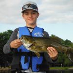 Jim Rice of Barrie sent in this photo of his nephew Ryan Rice with a smallmouth bass caught on a topwater lure on Lake Nippissing.