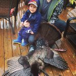 Stephen Hachey of Brantford, seen here with son Remington, harvested this turkey in Brant County with a crossbow.