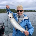 Wayne Lacko of Winnipeg sent in this photo of his wife Ramona with a lake trout she caught on Crow Lake, near Nestor Falls, that he enjoyed for his 60th birthday dinner.