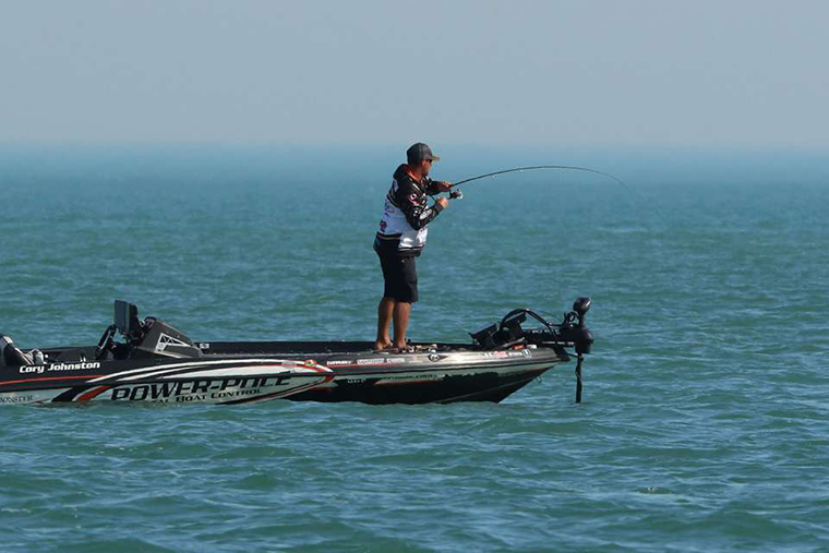 Cory Johnston fishing in boat