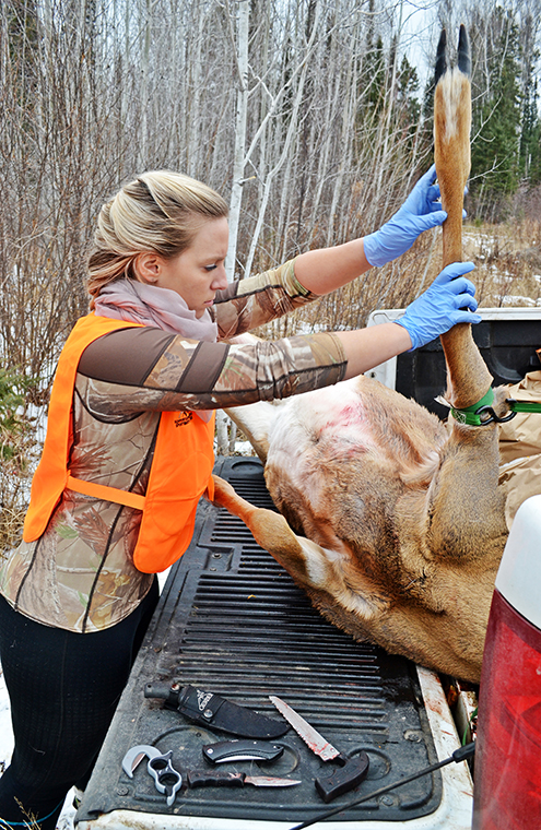 woman holding deer