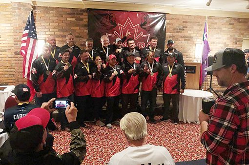 Members of Team Canada stand for a photo