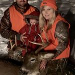Jessicah McCann of Perth celebrated her first muzzleloader harvest with family James Mullins and their two-month-old daughter.