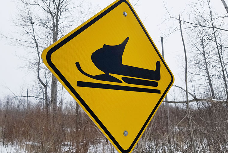 a snowmobile trail sign