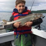 Jason Ritchie and his 10-year-old son Aidan of Meaford caught this natural Georgian Bay lake trout after two hours of being skunked.