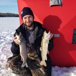 Thomas Benoit of Ottawa caught these splake using a white jig for one and a red devil tipped with frozen minnows for the other.