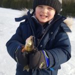 Tyler Duffy and son, Easton, of Godfrey enjoyed some steady perch action, leaving Easton hooked on ice fishing.