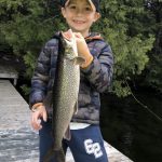 Benjamin Cooper of Georgetown caught his first lake trout off a dock in Haliburton.