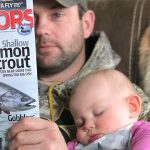 Chris Mink of Chatsworth caught up on some reading while Grace took a nap.