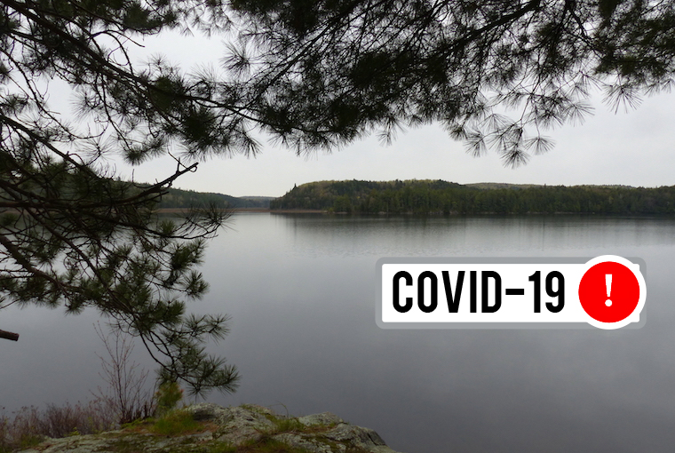 A lake framed by conifer trees