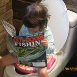 Canadian Armed forces retiree, Terrence Fader of North Lancaster, provided three-year-old granddaughter Georgia some reading material for her potty training.