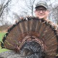 Andrew poses with turkey fan