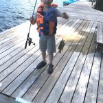 Jake Western of Vars stood back and watched his son Mason catch his first rock bass.