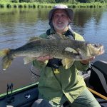 Ben Grieve of Thunder Bay enjoyed a beautiful summer afternoon targeting walleye, such as this 31-incher that was released.