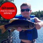 Photo Friday winner, Angus Adams, 7, of Tiny caught two beautiful smallmouth bass while fishing in 60 feet of water on Six Mile Lake with mom and dad. This four pounder was the larger of the two, and dad was very proud.