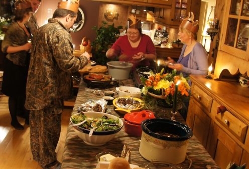 BeastFeast eats on a buffet table