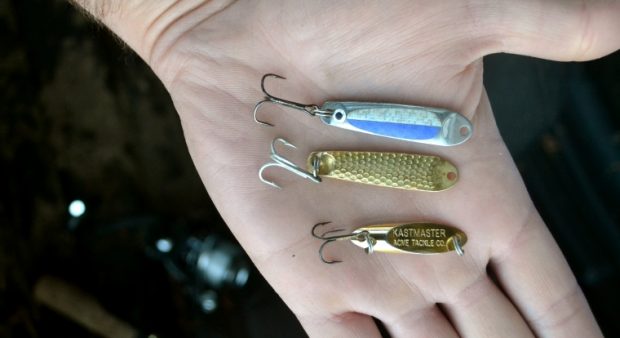 a trio of baits shown from an outstretched palm