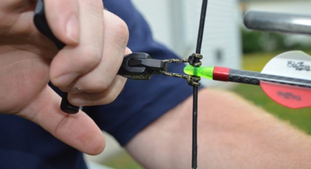 close-up of a hand-held release strap