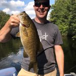 Matt Brown of Huntsville was out with family for a birthday cruise just outside of town, when they decided to check out some fallen trees on the shoreline on the way back. He watched his Senko sink into the tea-stained water before the line tightened, and moments later, his wife Sam had this 4-lb, 19-inch smallie in the net for a pic and quick release.