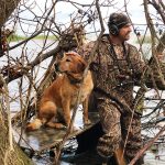 Craig Hall of Wyoming loves duck hunting, but his 4-legged friend lives for it.