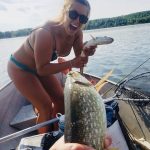 Laura Sandre of Walkerton and her boyfriend, Clark Wilkinson, were  exploring a new lake when they caught and released two pikes  simultaneously. “New rod, big winds, GREAT fish!” 